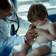 Doctor listening to a child's heart